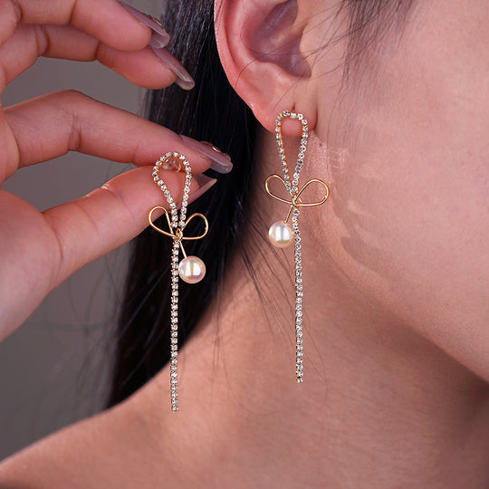 Pearl Earrings with Bowknot Design