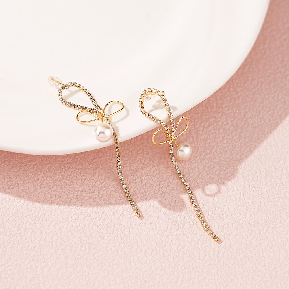 Pearl Earrings with Bowknot Design