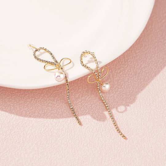 Pearl Earrings with Bowknot Design