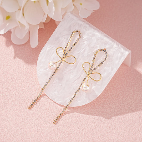 Pearl Earrings with Bowknot Design