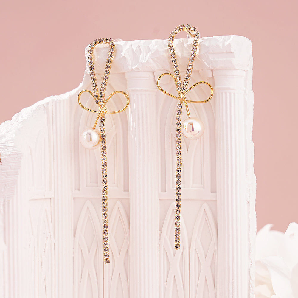 Pearl Earrings with Bowknot Design