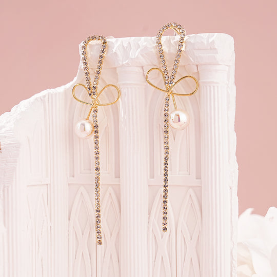 Pearl Earrings with Bowknot Design