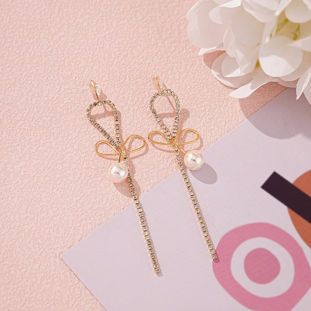 Pearl Earrings with Bowknot Design