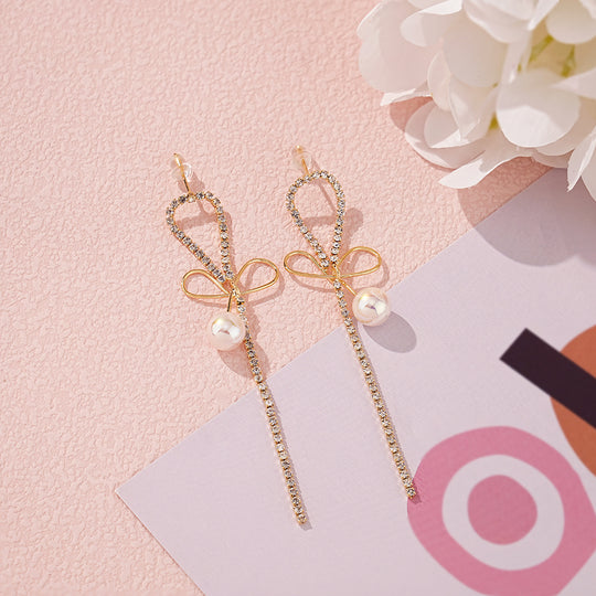 Pearl Earrings with Bowknot Design
