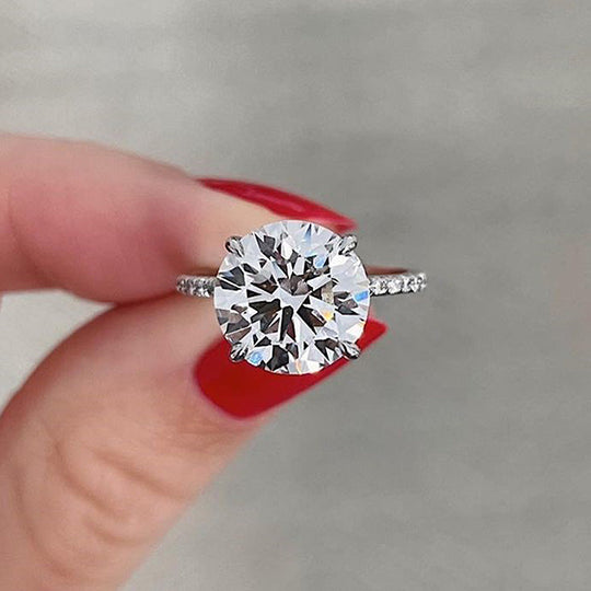 Luxurious Round Cut 4 Prong Engagement Ring For Women In Sterling Silver