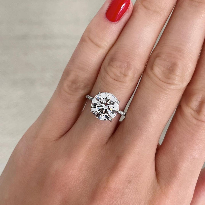 Luxurious Round Cut 4 Prong Engagement Ring For Women In Sterling Silver