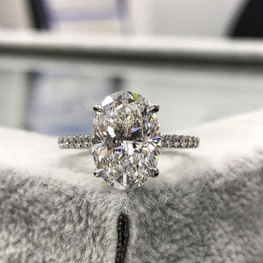 Classic Oval Cut Simulated Diamond Engagement Ring In White Gold