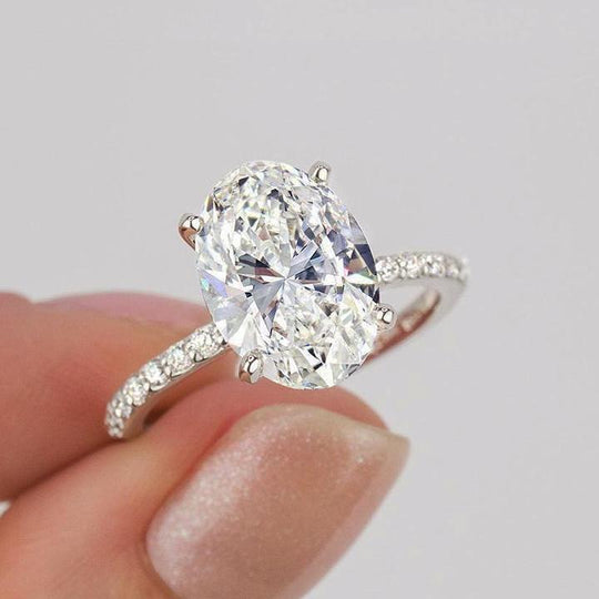 Classic Oval Cut Simulated Diamond Engagement Ring In White Gold